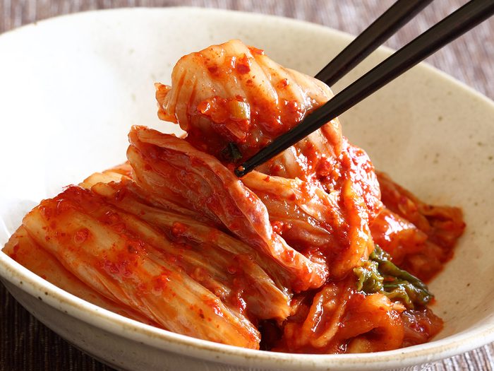 Healthy foods, bowl of kimchi with chopsticks