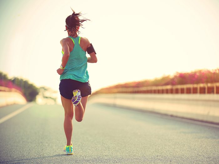 Shortness of breath, woman running on the road
