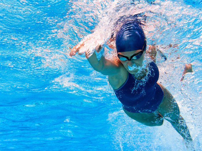 Shortness of breath, woman swimming in pool
