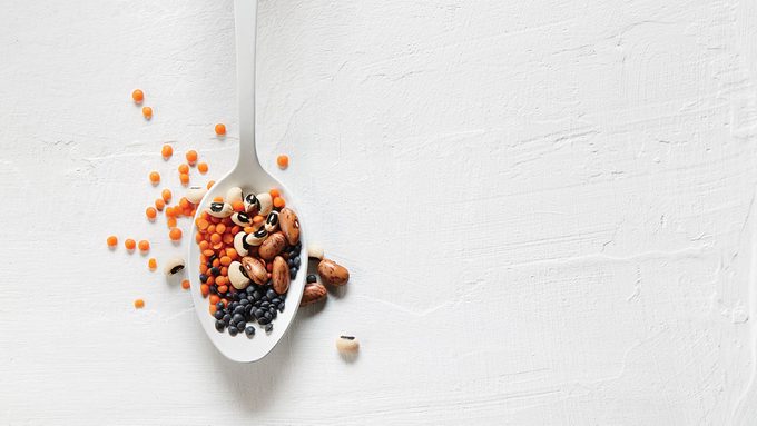 Pulses, lentils on a spoon