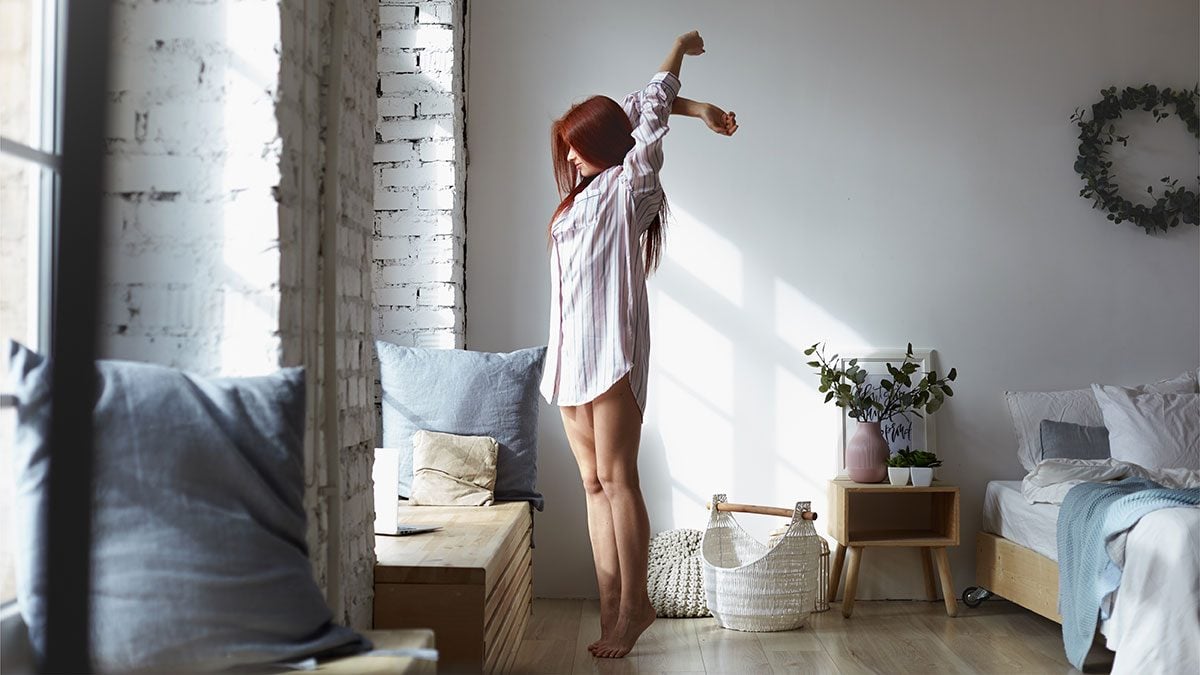 Treat Insomnia, woman stretching in the morning