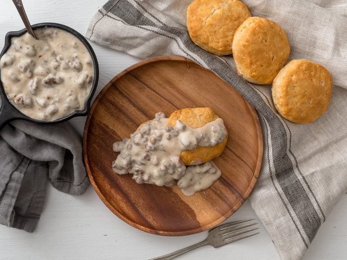 Traditional Southern dish of biscuits and sausage gravy. Hearty and filling food for breakfast or brunch.