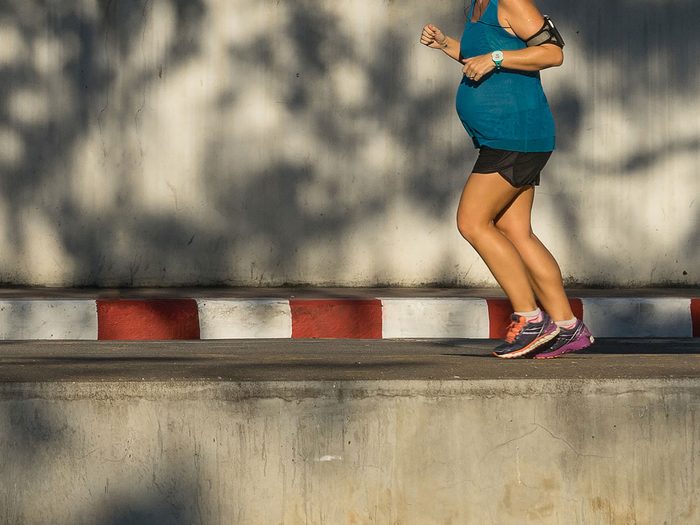 woman running pregnant