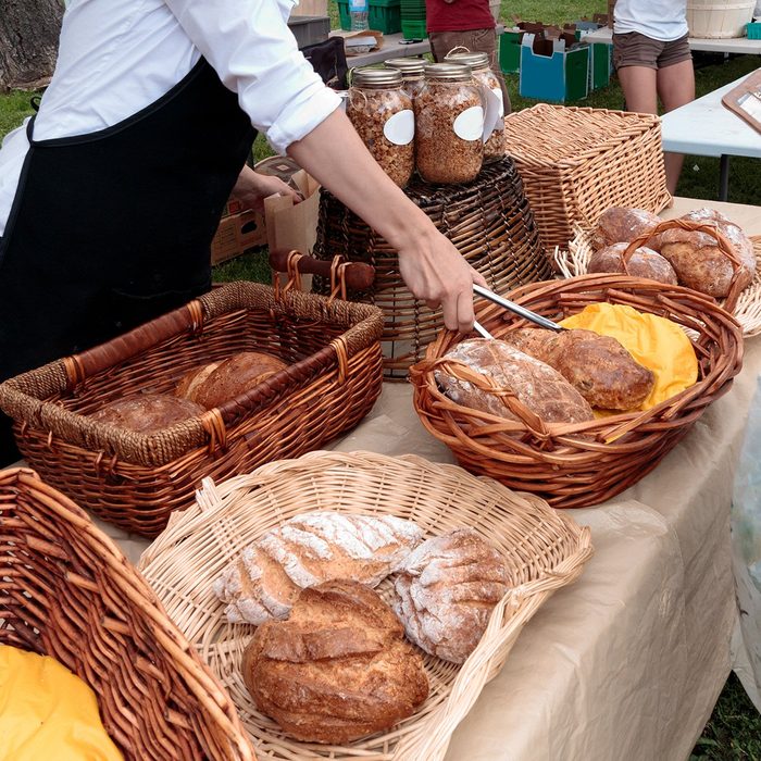 Sale of organic loaves at outdoor farmers market