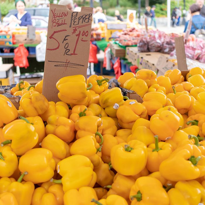 yellow bell peppers for sale at an outdoor farmer's market; Shutterstock ID 1175188264; Job (TFH, TOH, RD, BNB, CWM, CM): TOH