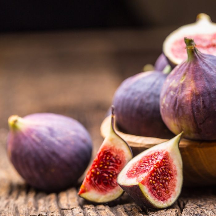 A few figs in a bowl on an old wooden background.; Shutterstock ID 743841358; Job (TFH, TOH, RD, BNB, CWM, CM): TOH