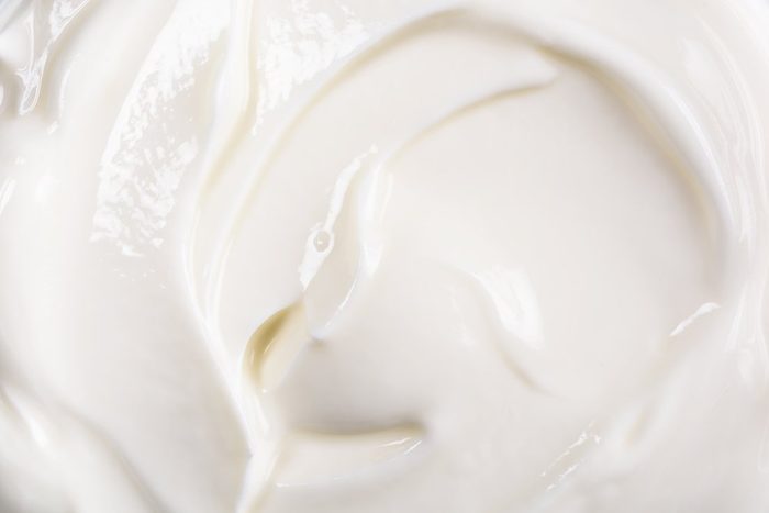 Fresh White Yogurt Background Closeup