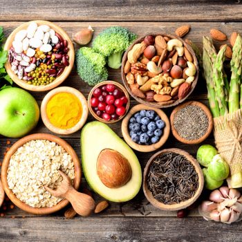 fall Superfoods, vegetables, fruits, seeds, legumes, nuts and grains for vegan and vegetarian eating. Clean eating. Detox, dieting food concept. Top view .