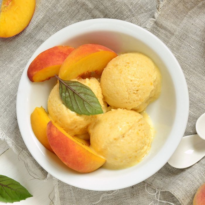 Homemade peach ice cream, sorbet, top view; Shutterstock ID 533648374; Job (TFH, TOH, RD, BNB, CWM, CM): Taste of Home