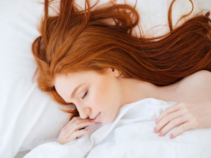 flu season - woman sleeping
