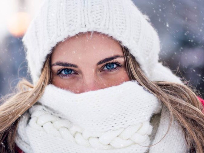 flu season - scarf on woman