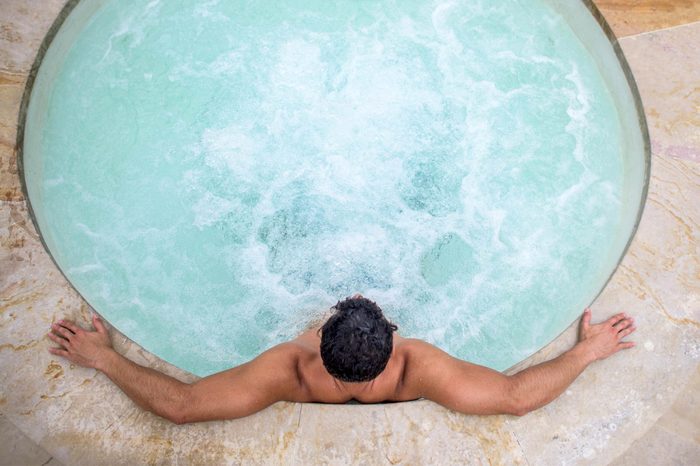 Boost Male Fertility | man in a whirlpool hot tub