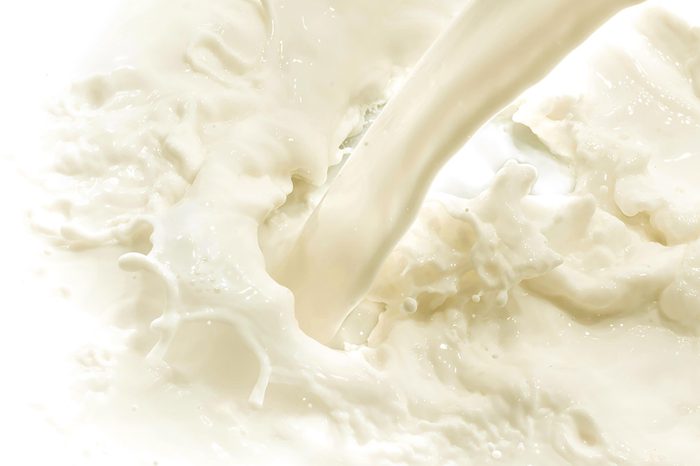 splashing milk on white background