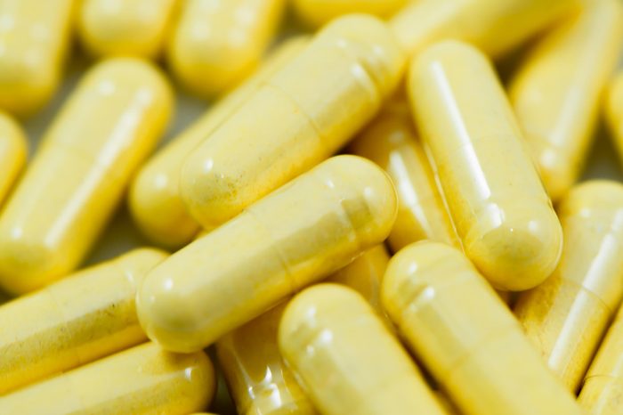 yellow supplement capsules