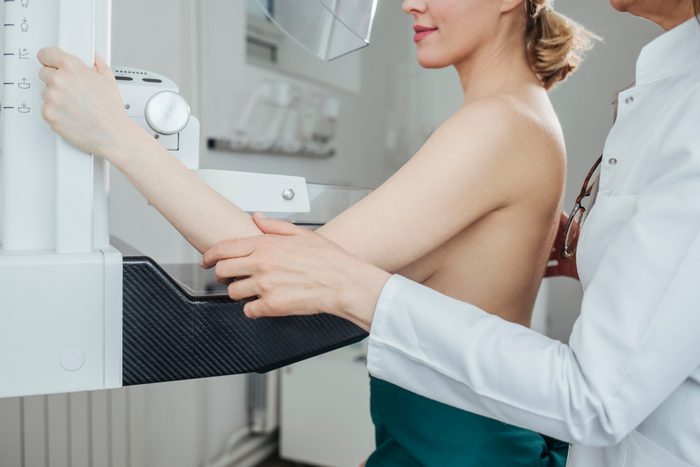 A woman having mammography examination at hospital.
