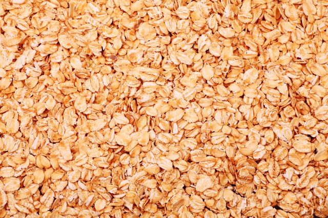 Food theme: fresh whole grain oats background.