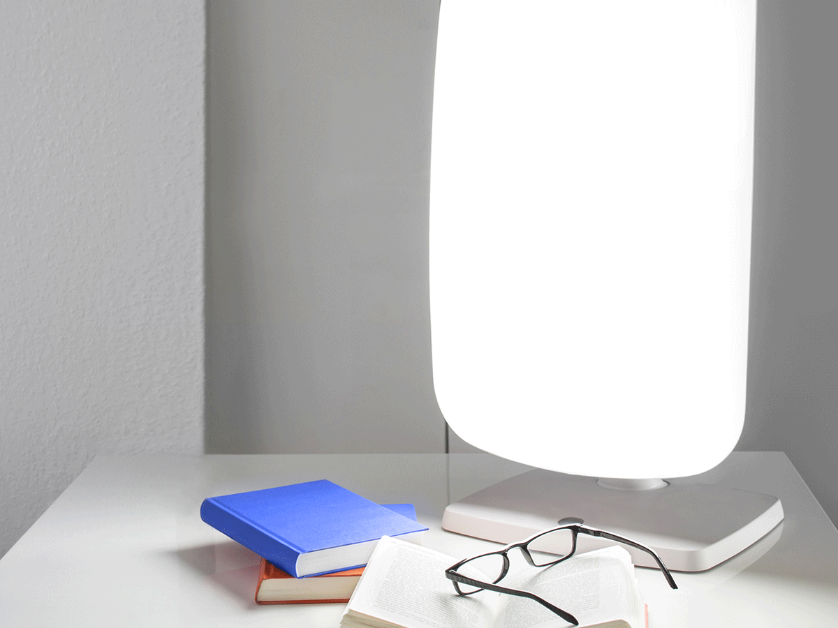 light therapy lamp on desk