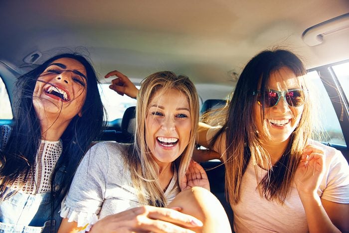 Boost your immunity naturally | 3 women in a car laughing