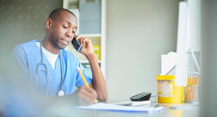 male doctor on the phone with patient