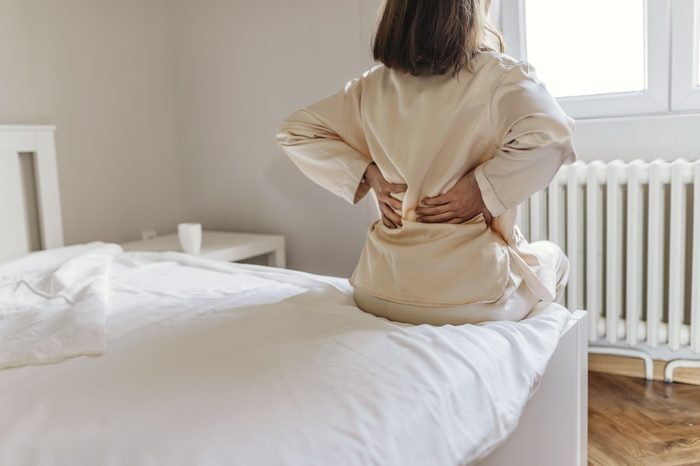 woman sick with aches and pains or myalgia