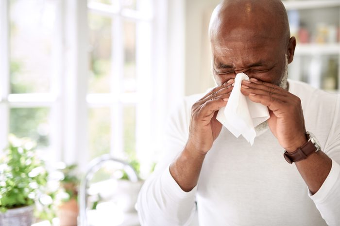 Boost your immunity naturally | man with seasonal allergies
