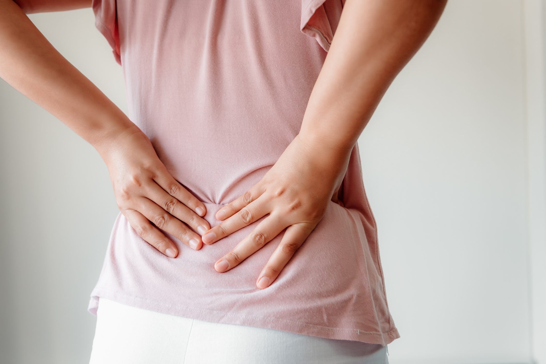 woman experiencing lower back pain