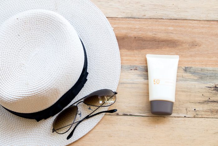 sunscreen, hat and glasses