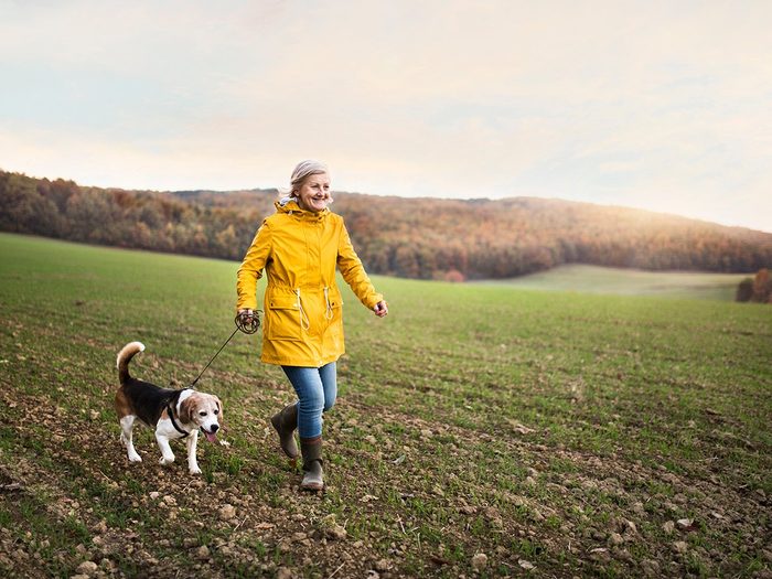 How to make walking less boring - woman walking dog