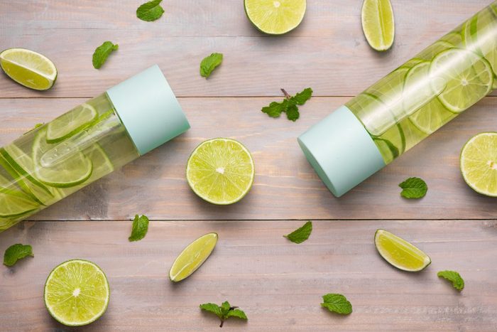 Water with Lime and Mint in Sports Bottle, with slices of lime. | foods to avoid before workout