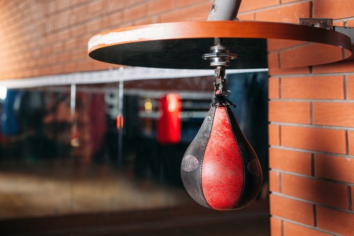 fitness after 50 | Black and red punching bag. 