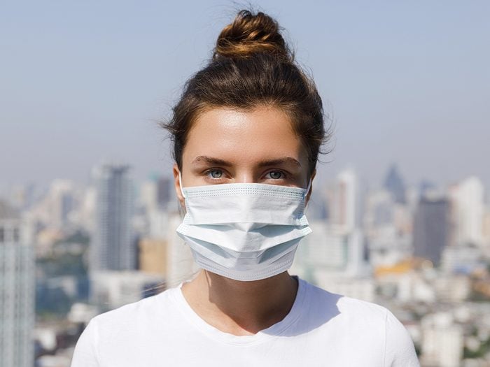 maskne | woman wearing pandemic face mask