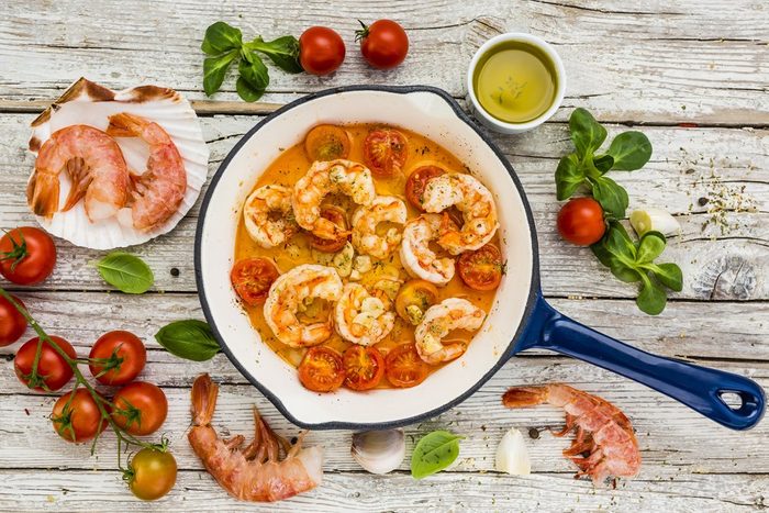 shrimp with tomatoes and garlic. Mediterranean food.