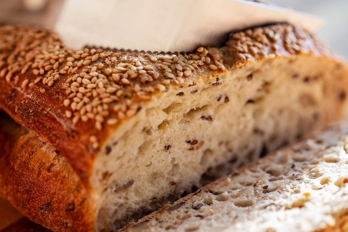 diabetic breakfast | Close up of slicing bread