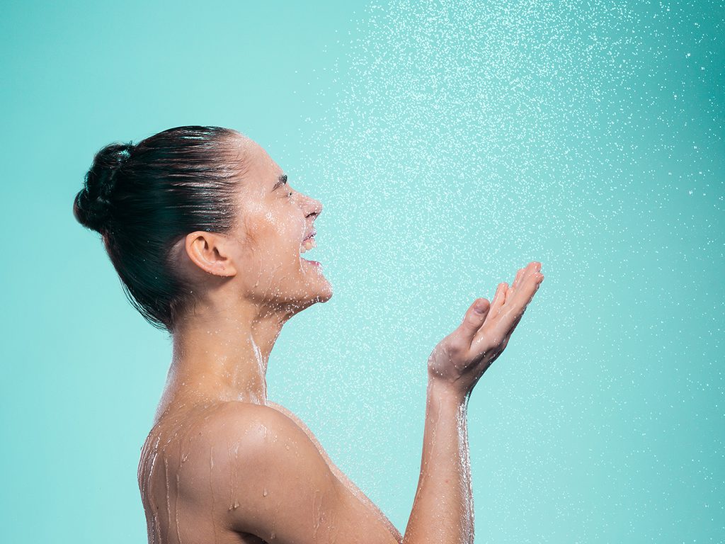 benefits of cold shower | woman in shower
