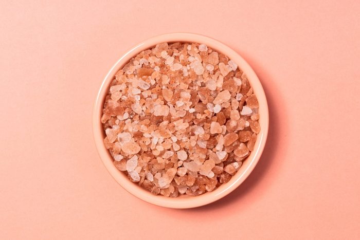 healthiest salt | bowl of pink salt againstp ink background