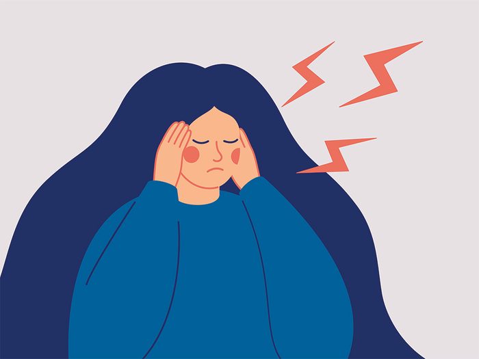 headache-vs-migraine | illustration of a woman clutching her head