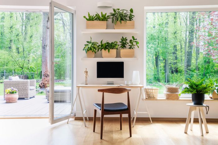 healthier home changes | home office with lots of plants and desk