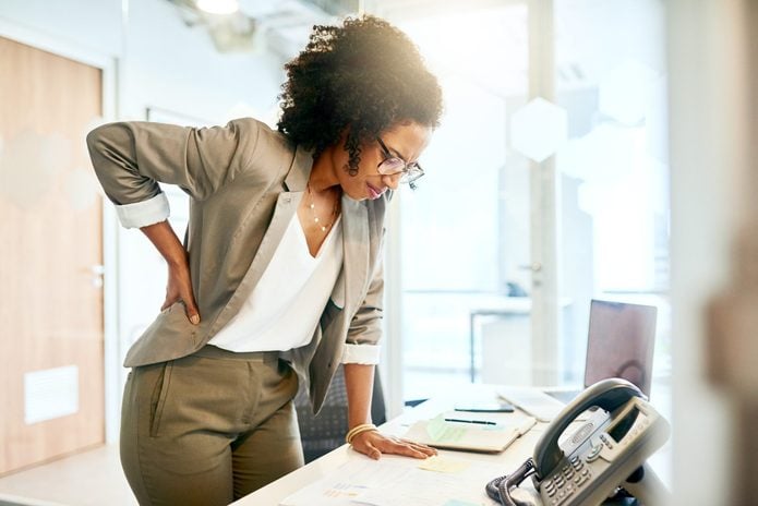 lower back pain in women | Prolonged Sitting Puts A Lot Of Strain On The Lower Back