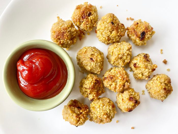 millet tots | image of millet tots and ketchup on a table