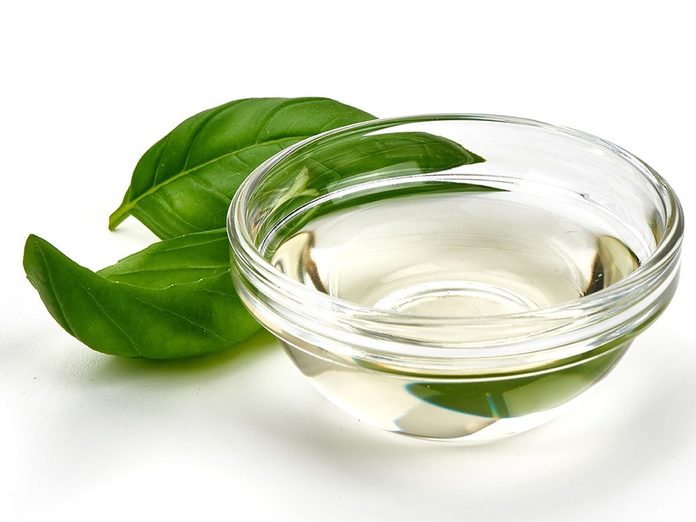 bowl of vinegar with basil.