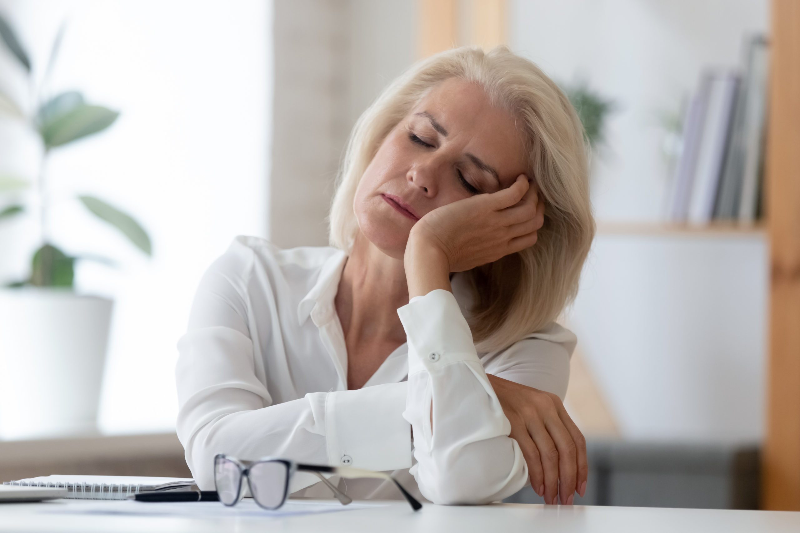 perimenopause symptoms | Exhausted,aged,woman,worker,sit,at,office,desk,fall,asleep