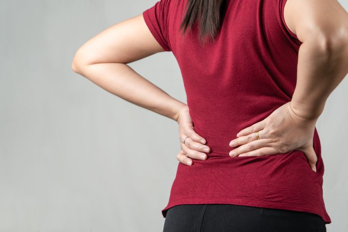 back pain | woman with back pain