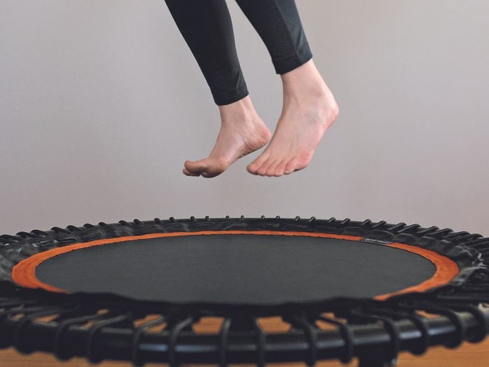 rebounder trampoline exercise | close up of feet on a rebounder