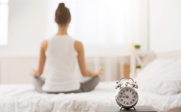 Early Awakening Woman Practicing Yoga In The Morning