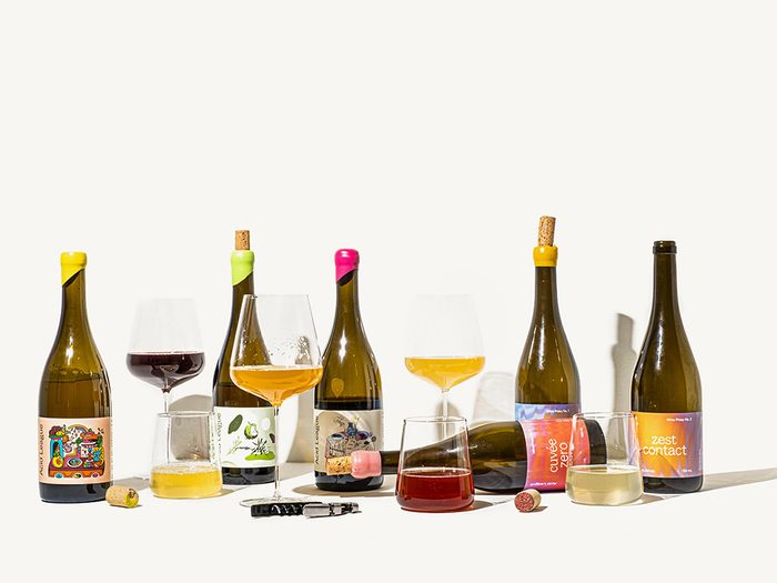 Acid League Wine Proxies | bottles of wine proxies with glasses next to them