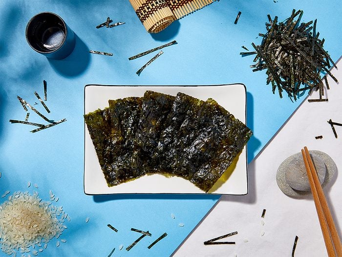 Health Benefits Of Nori | shot of nori on a white and blue backdrop