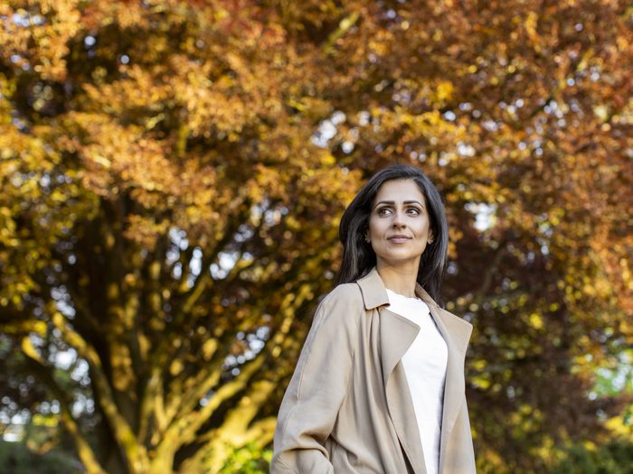 living with endometriosis | Roop Bassra Stands In Vancouver's Queen Elizabeth Park On April 26, 2021.