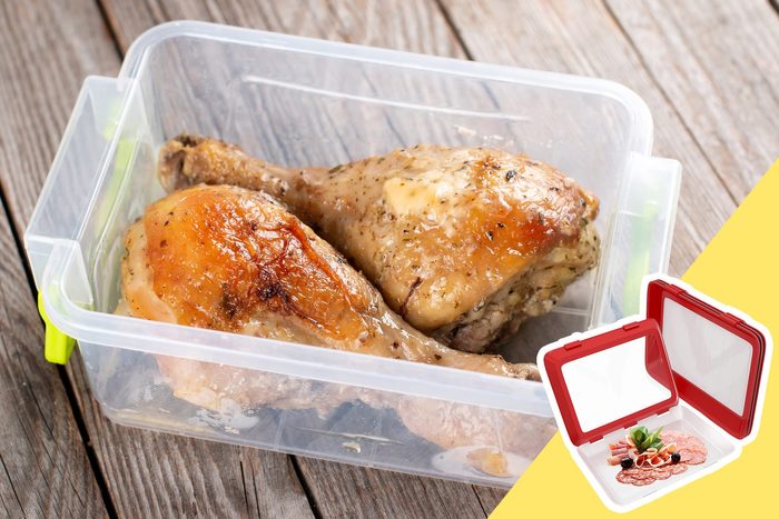 Cooked Chicken in a container with inset of meat containers
