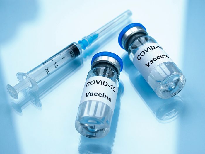 pfizer vs moderna | Two vials of COVID-19 vaccine