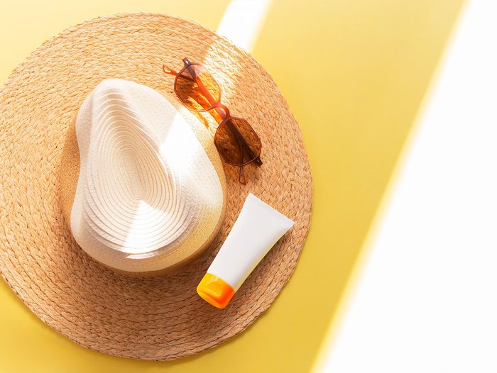 Sunprotection,objects.,straw,woman's,hat,with,sun,glasses,and,protection